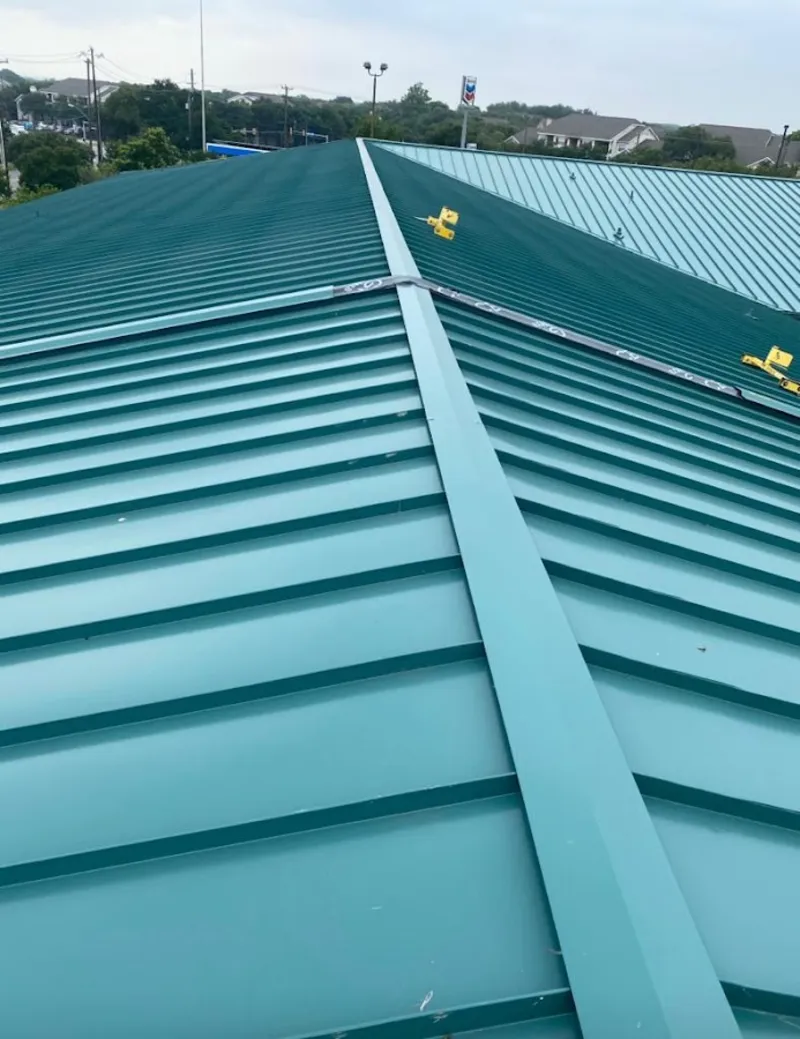 Green commercial metal roof ridge and valley for Metal Roof Repair in Brookings